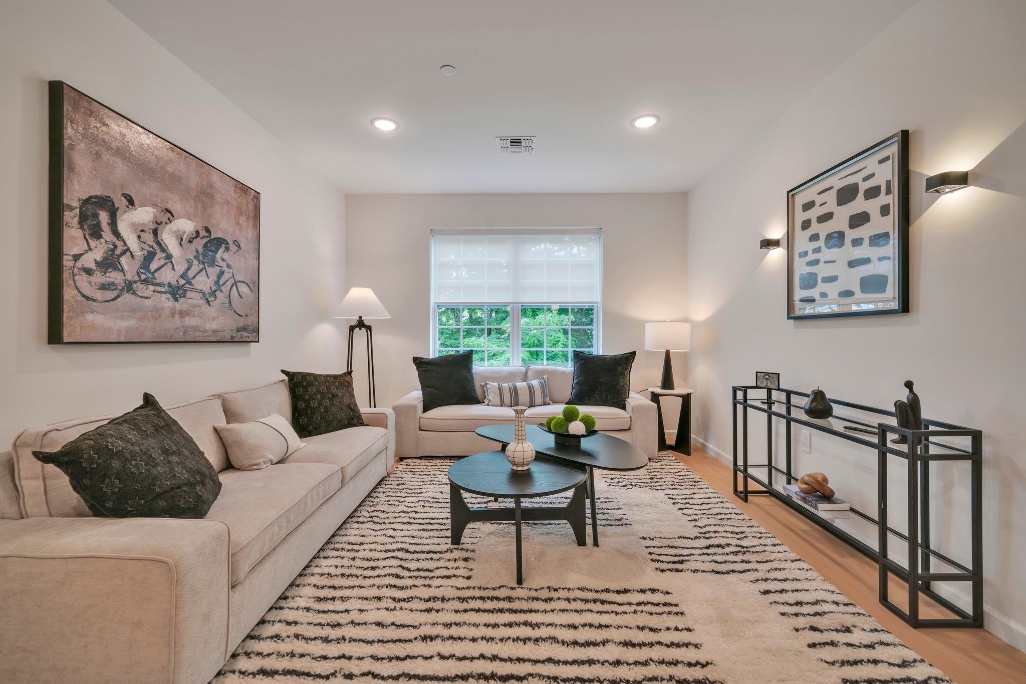 74 Ridgedale Avenue, Unit 304 Morristown, NJ 07960 - Photo 10 of 42 a living room with furniture and a rug