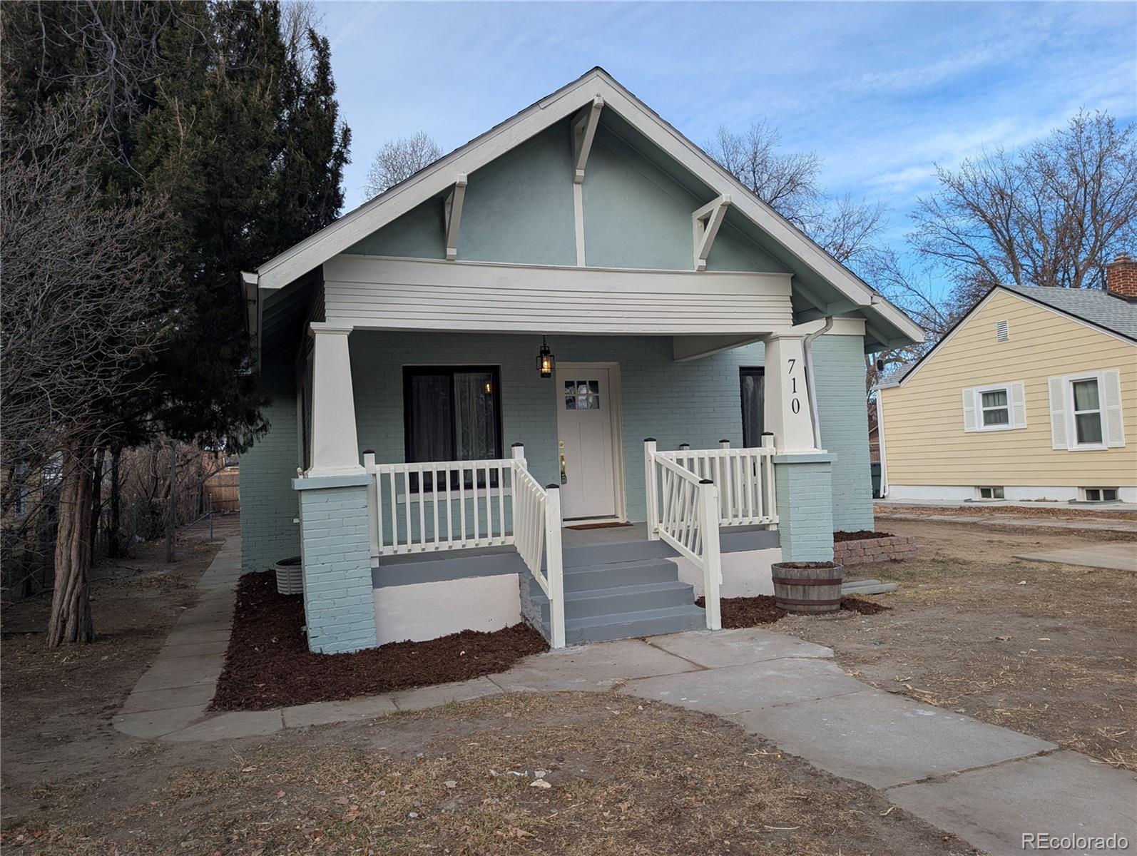 710 Carson Street Brush, CO 80723 - Photo 27 of 30 a front view of a house with a porch