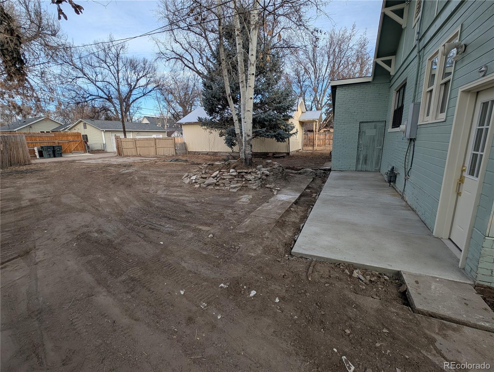 710 Carson Street Brush, CO 80723 - Photo 28 of 30 a view of a old house with a yard