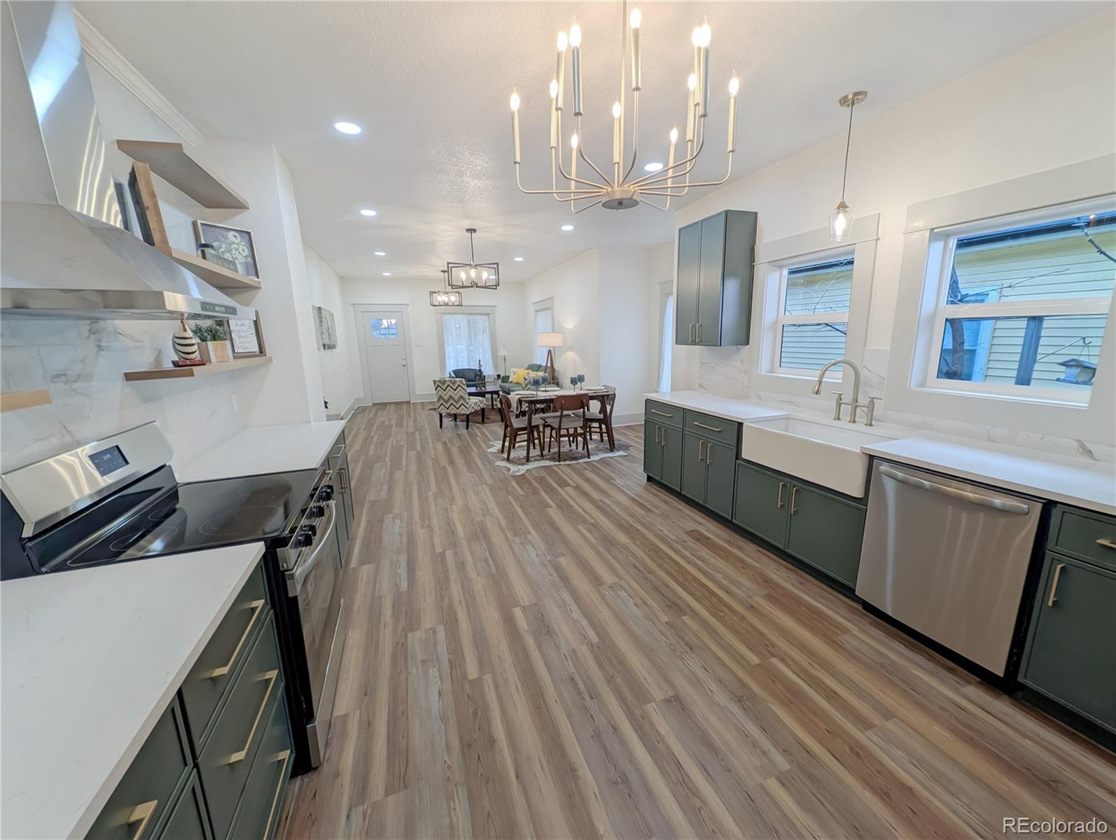 710 Carson Street Brush, CO 80723 - Photo 4 of 30 a large kitchen with a table and chairs
