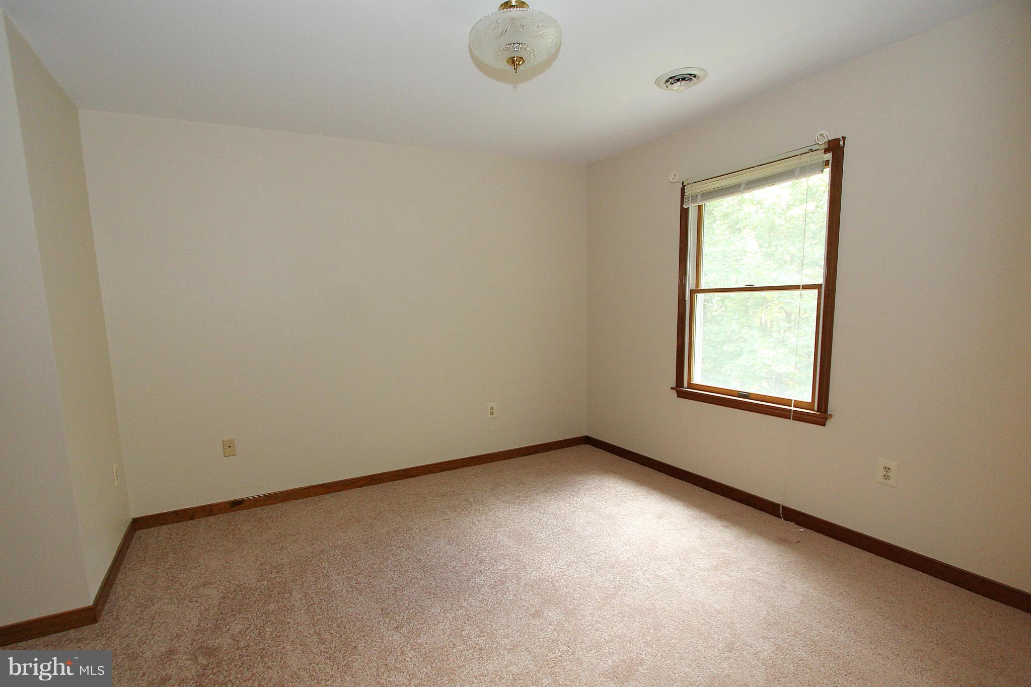3154 Charles Street Fallston, MD 21047 - Photo 22 of 30 an empty room with a window