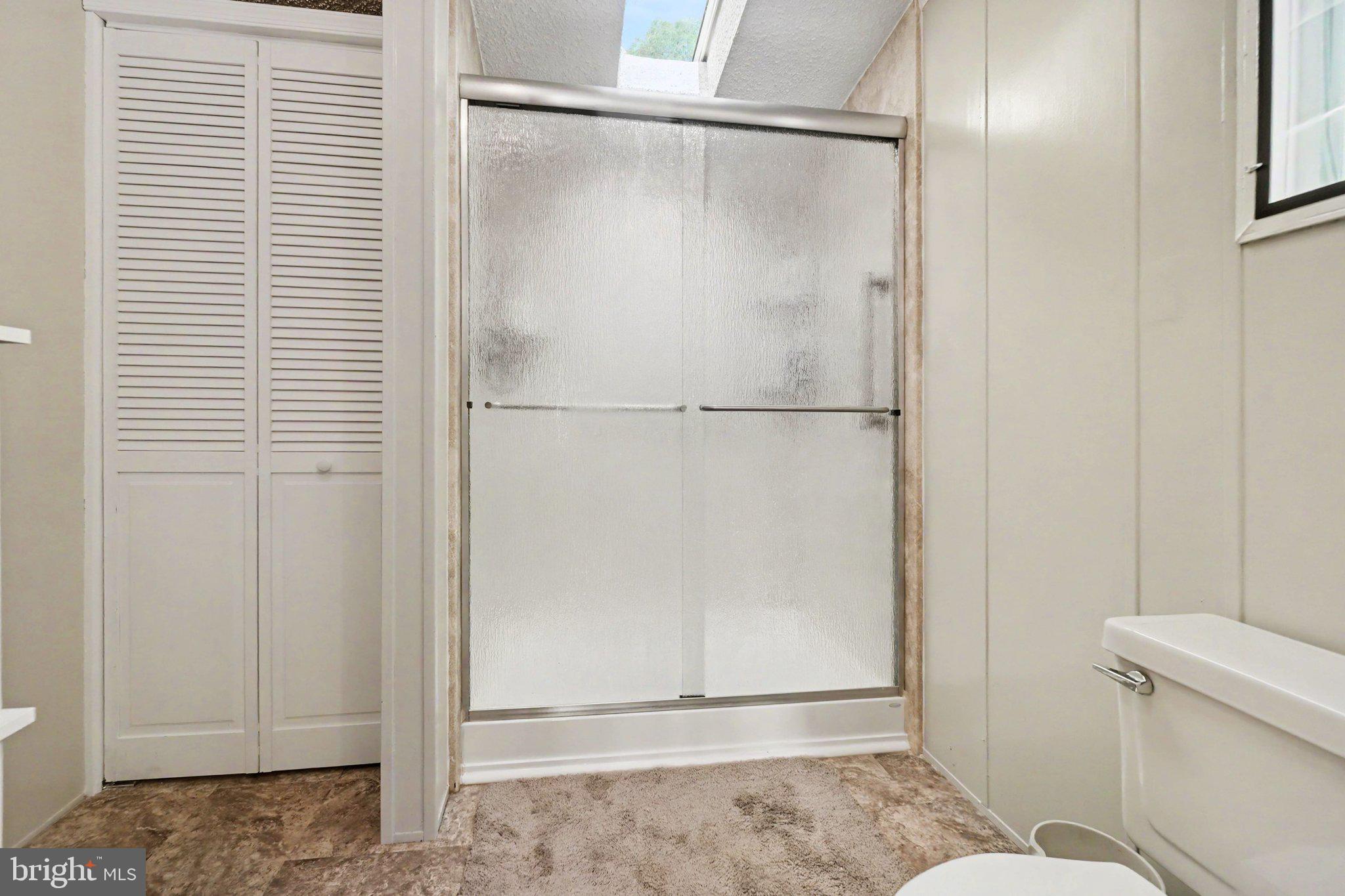 46 Pisgah Rest Shermans Dale, PA 17090 - Photo 18 of 36 a bathroom with a glass shower door