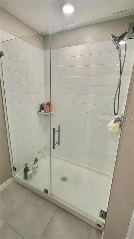 31363 Sun Kettle Loop Wesley Chapel, FL 33545 - Photo 22 of 29 a bathroom with a shower
