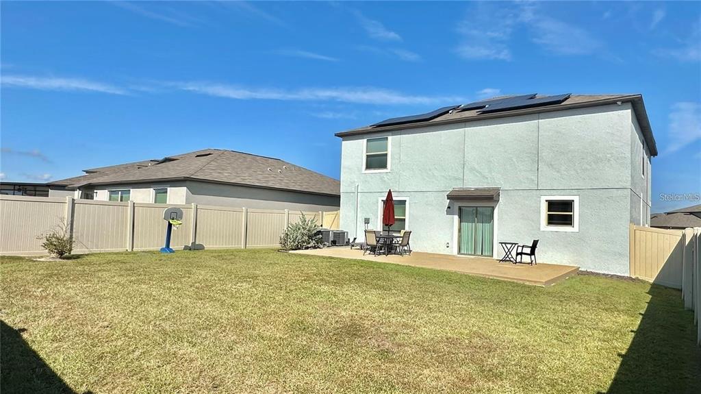 31363 Sun Kettle Loop Wesley Chapel, FL 33545 - Photo 6 of 29 a big room with table and chairs