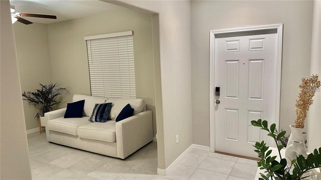 31363 Sun Kettle Loop Wesley Chapel, FL 33545 - Photo 8 of 29 a living room with furniture