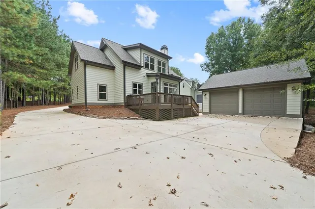 a bathroom with a shower and a sink