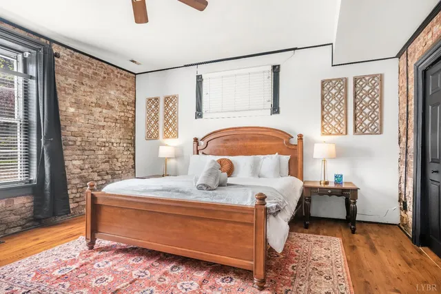 a view of a dining room with furniture and window