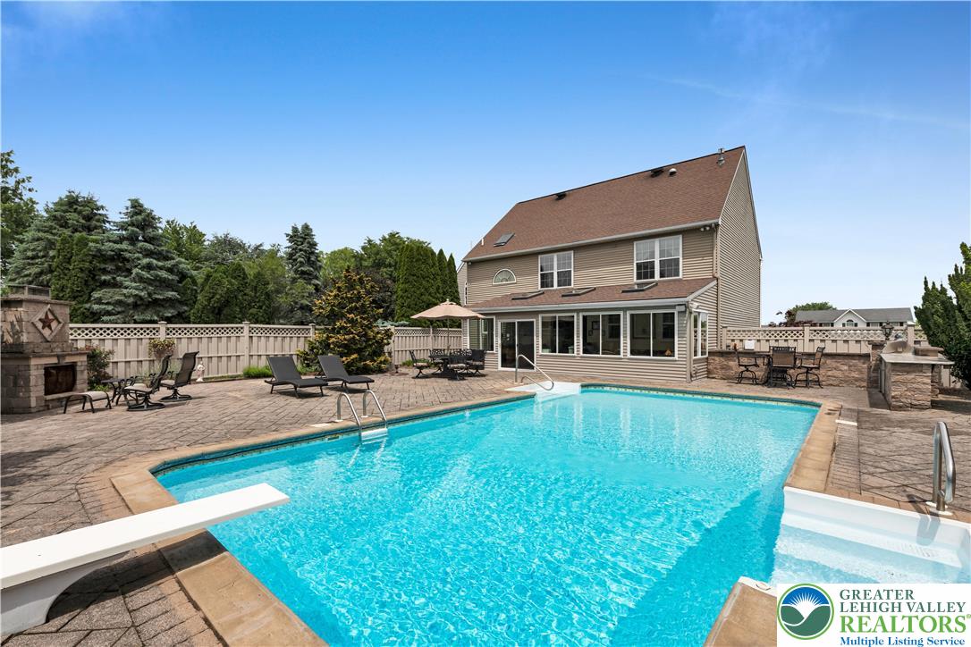 3830 McIntosh Drive Orefield, PA 18069 - Photo 28 of 36 a view of a house with swimming pool and sitting area