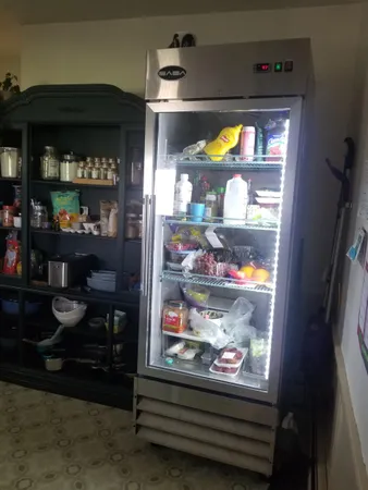 a kitchen with a stove and cabinets