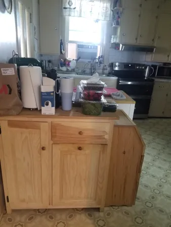 a dining room with a table and chairs