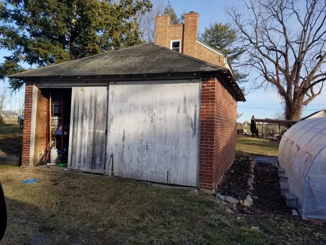 a backyard of a house with lots of green space