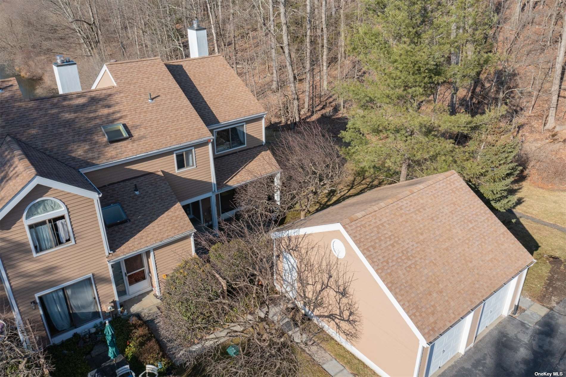 103 Rambling Brook Road, Unit 103 Chappaqua, NY 10514 - Photo 1 of 1 a view of a house with a yard