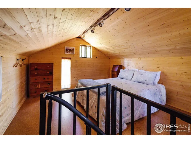 a balcony view with two windows