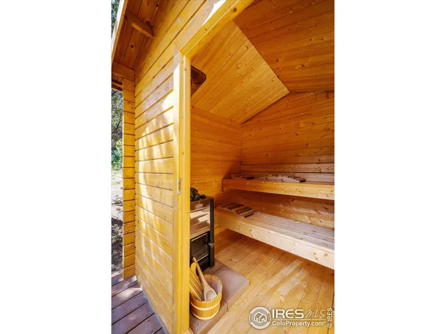 a view of a room with a furniture and floor to ceiling window