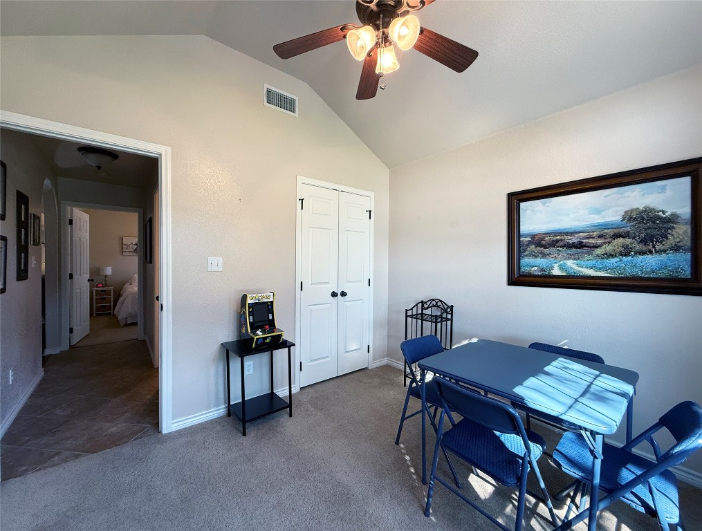 1502 Hamilton Street Burnet, TX 78611 - Photo 22 of 26 a view of a livingroom with furniture and a bookshelf