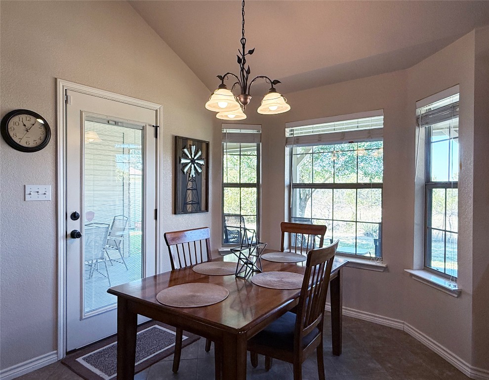 1502 Hamilton Street Burnet, TX 78611 - Photo 9 of 26 a view of a dining room with furniture window and wooden floor