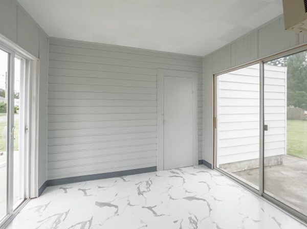 47 Bourbeau Street Chicopee, MA 01020 - Photo 15 of 19 a view of a room with a wooden floor and a window