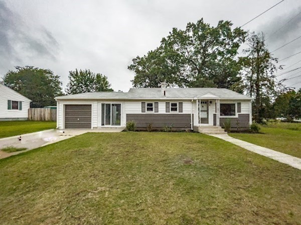 47 Bourbeau Street Chicopee, MA 01020 - Photo 2 of 19 a house with trees in the background