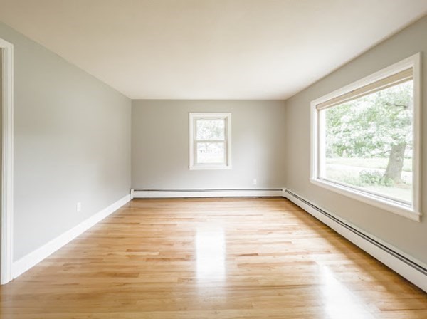 47 Bourbeau Street Chicopee, MA 01020 - Photo 7 of 19 a view of a room with wooden floor and window
