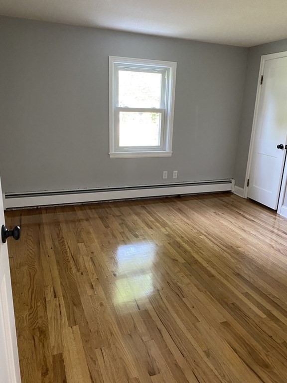 47 Bourbeau Street Chicopee, MA 01020 - Photo 10 of 19 a view of a room with wooden floor and a window