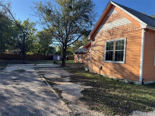 a view of backyard with green space