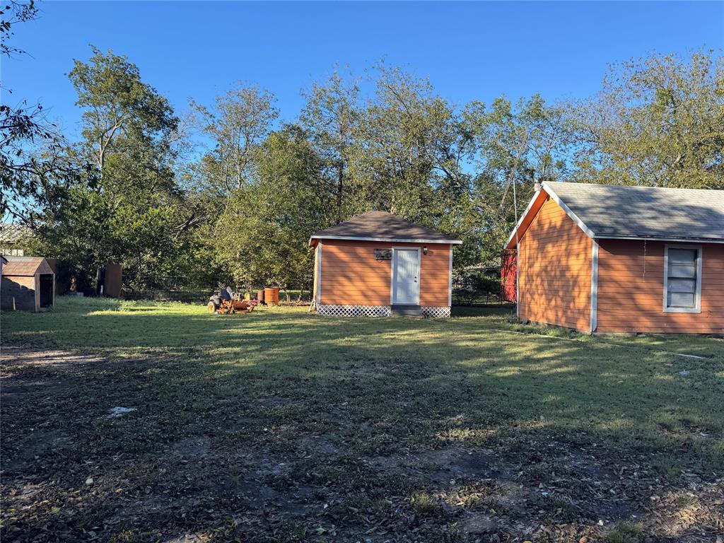 309 Elmo Street Cleburne, TX 76031 - Photo 5 of 5 a view of backyard with green space