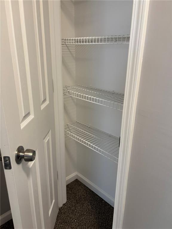 5739 Windfall Lane Lithonia, GA 30058 - Photo 26 of 36 a bathroom with a glass door