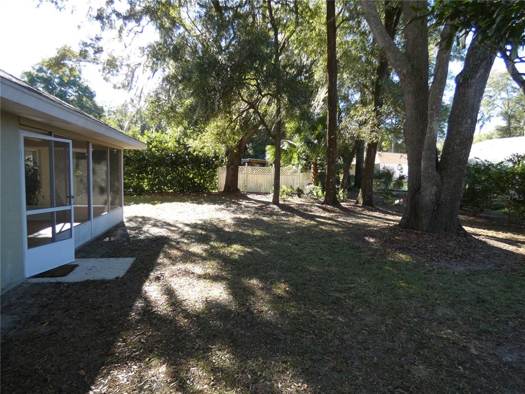 19181 Southwest 90th Ln Road Dunnellon, FL 34432 - Photo 17 of 37 a view of a house with a yard
