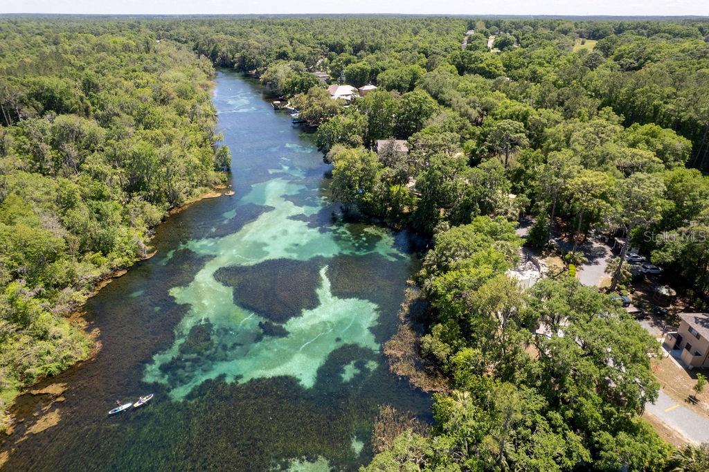 19181 Southwest 90th Ln Road Dunnellon, FL 34432 - Photo 30 of 37 an aerial view of a house with a yard and lake view