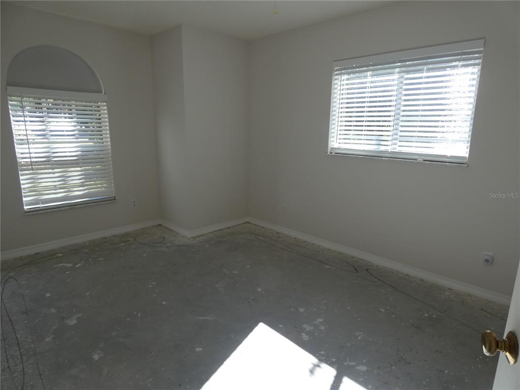 19181 Southwest 90th Ln Road Dunnellon, FL 34432 - Photo 7 of 37 a view of a room that has a window in it