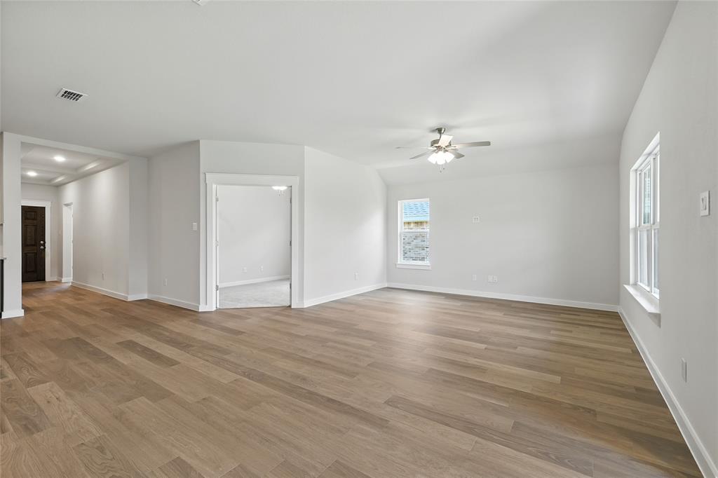 604 Martell Road Princeton, TX 75407 - Photo 11 of 38 a view of an empty room with a window