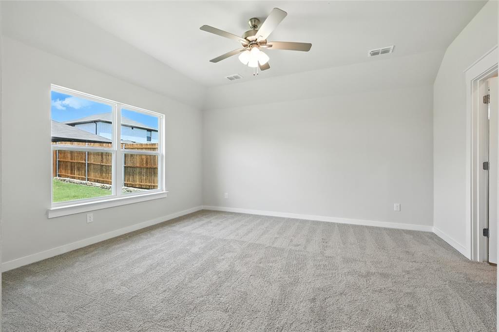 604 Martell Road Princeton, TX 75407 - Photo 17 of 38 a view of an empty room with a window