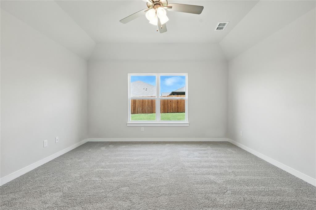 604 Martell Road Princeton, TX 75407 - Photo 18 of 38 an empty room with a window