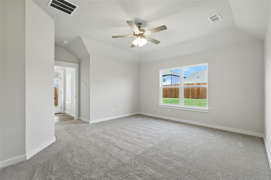 604 Martell Road Princeton, TX 75407 - Photo 19 of 38 an empty room with windows and fan