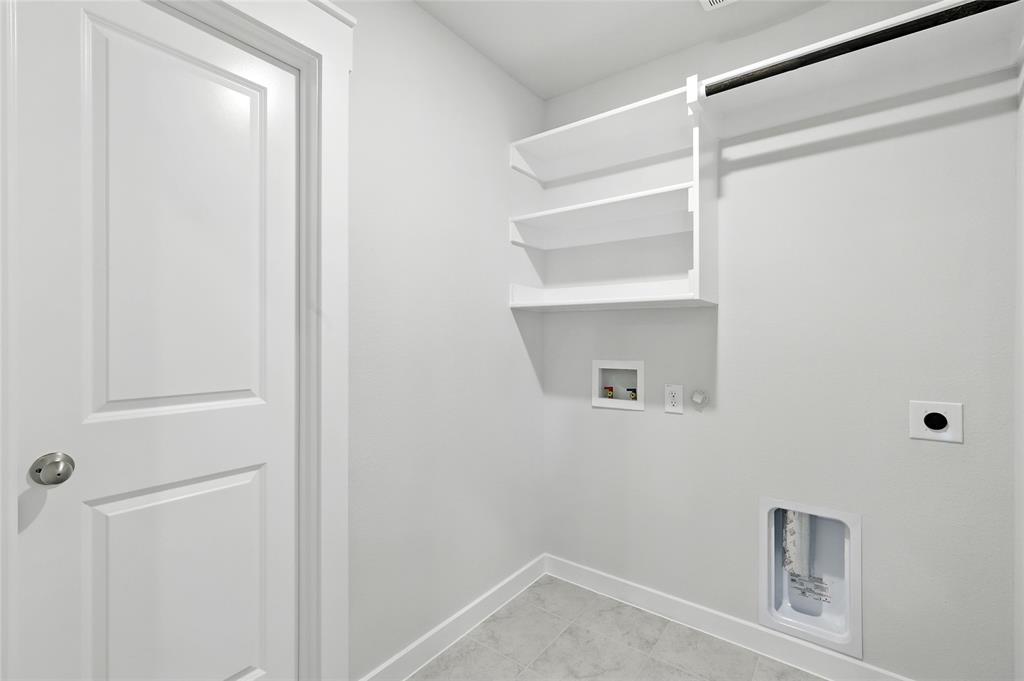 604 Martell Road Princeton, TX 75407 - Photo 25 of 38 a view of an empty walk in closet