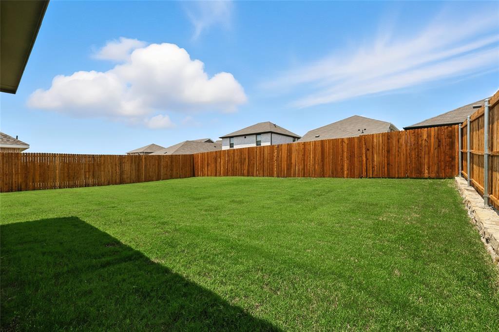 604 Martell Road Princeton, TX 75407 - Photo 30 of 38 a view of an entrance to house with yard