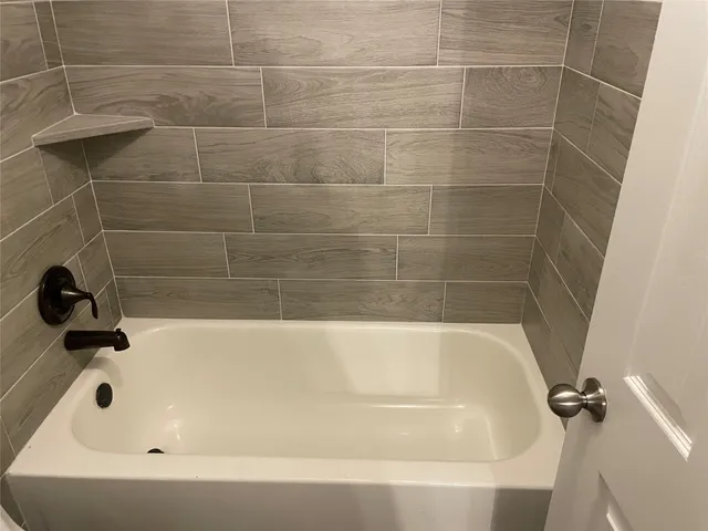 a bathroom with a bathtub