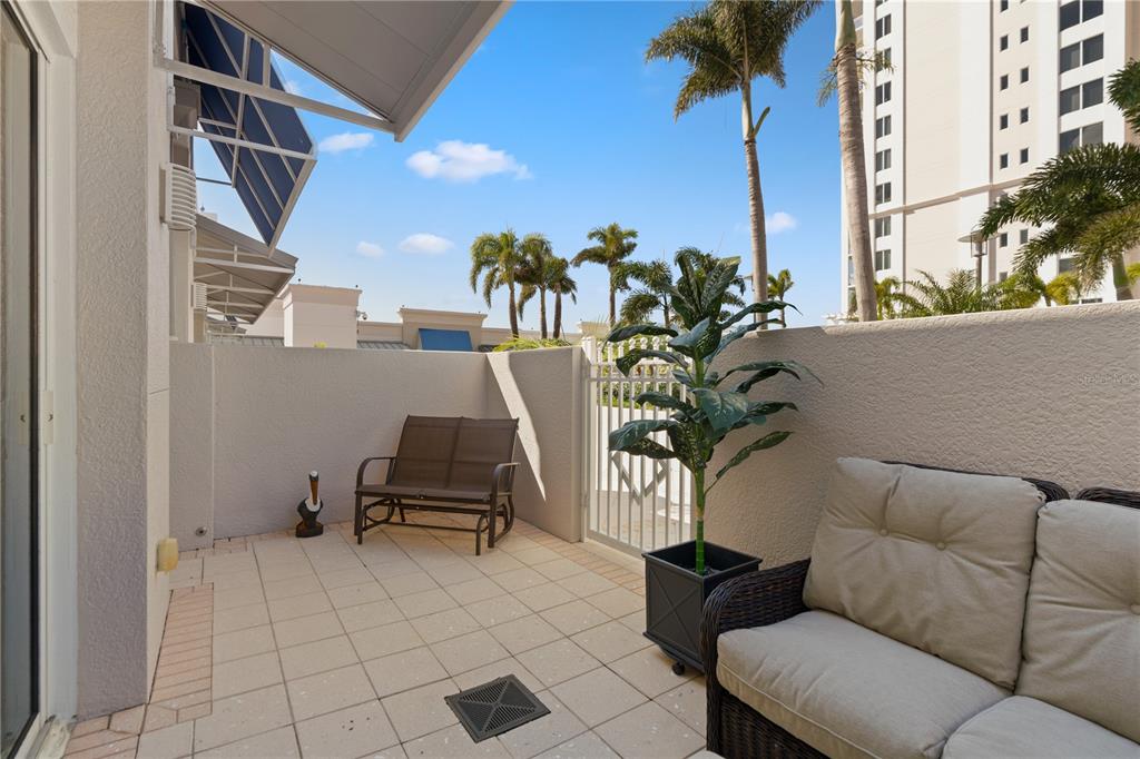 331 Cleveland Street, Unit 312 Clearwater, FL 33755 - Photo 22 of 36 a view of terrace with seating space and potted plants