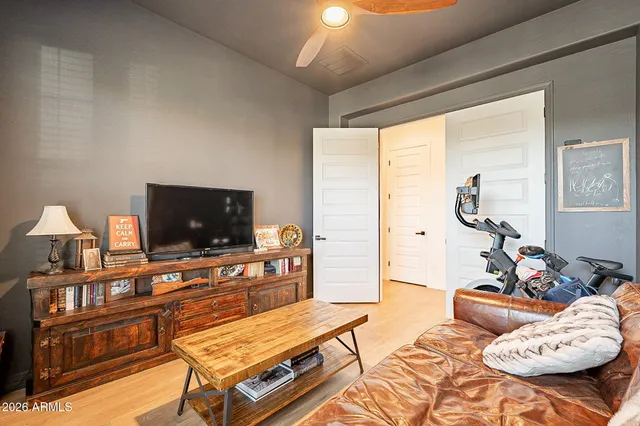 a bathroom with a window and a shower curtain