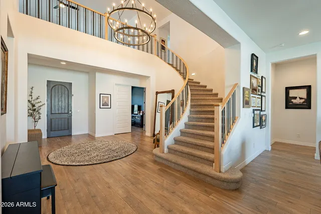 a living room with fireplace furniture and a fireplace