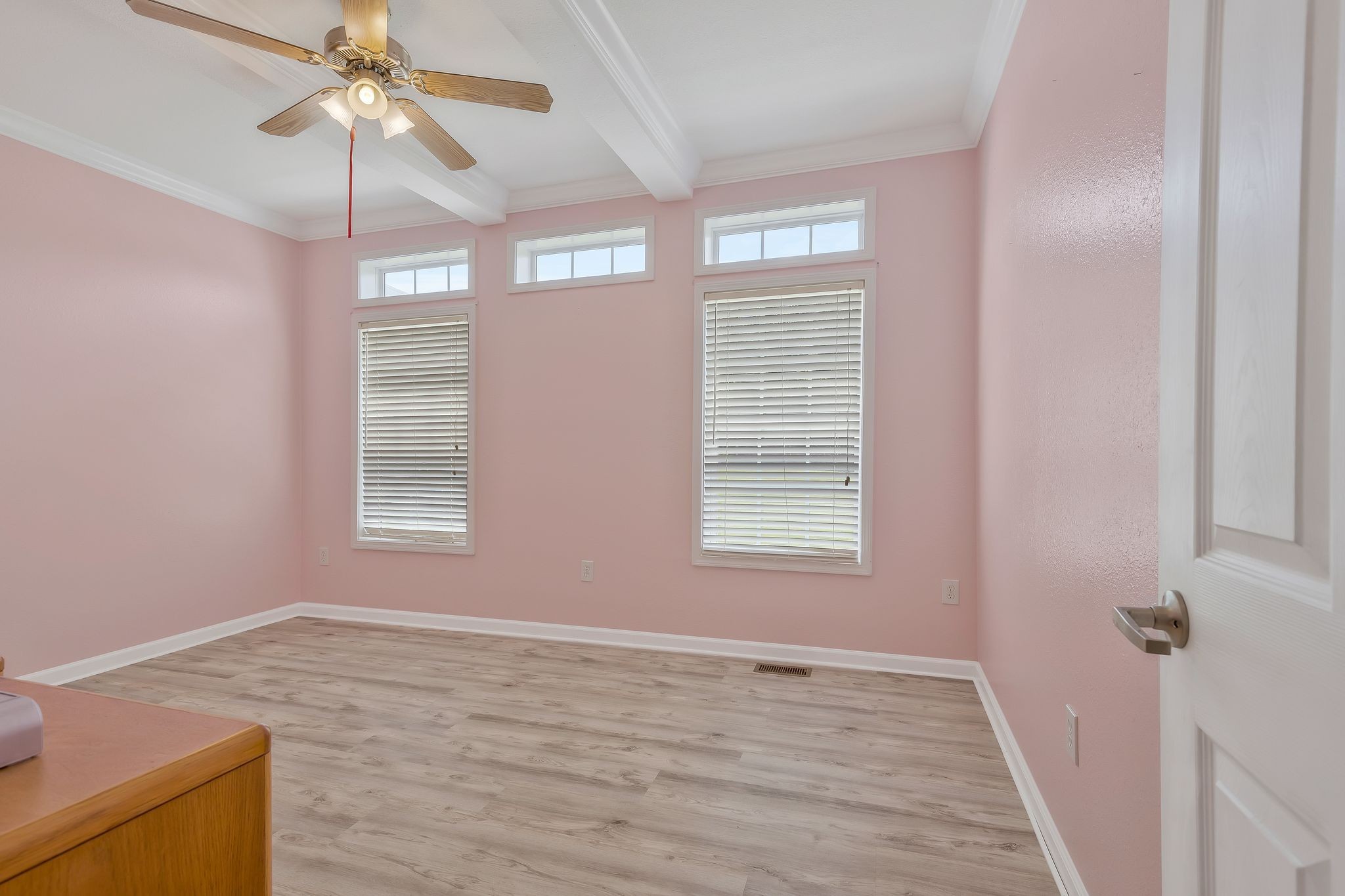 4595 Chestnut Ridge Road Columbia, TN 38401 - Photo 16 of 26 a view of an empty room with a window and wooden floor