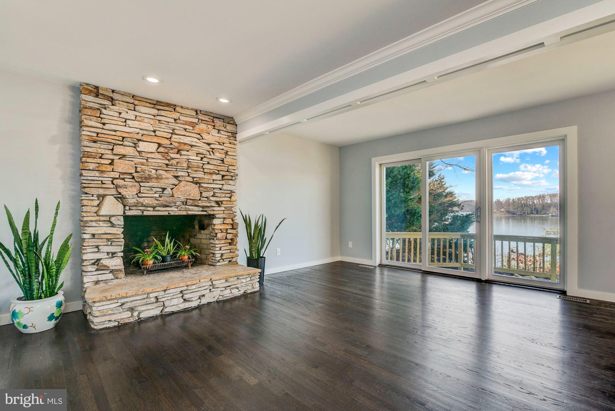 237 Long Point Road Crownsville, MD 21032 - Photo 36 of 77 Stone Fireplace in Family Room