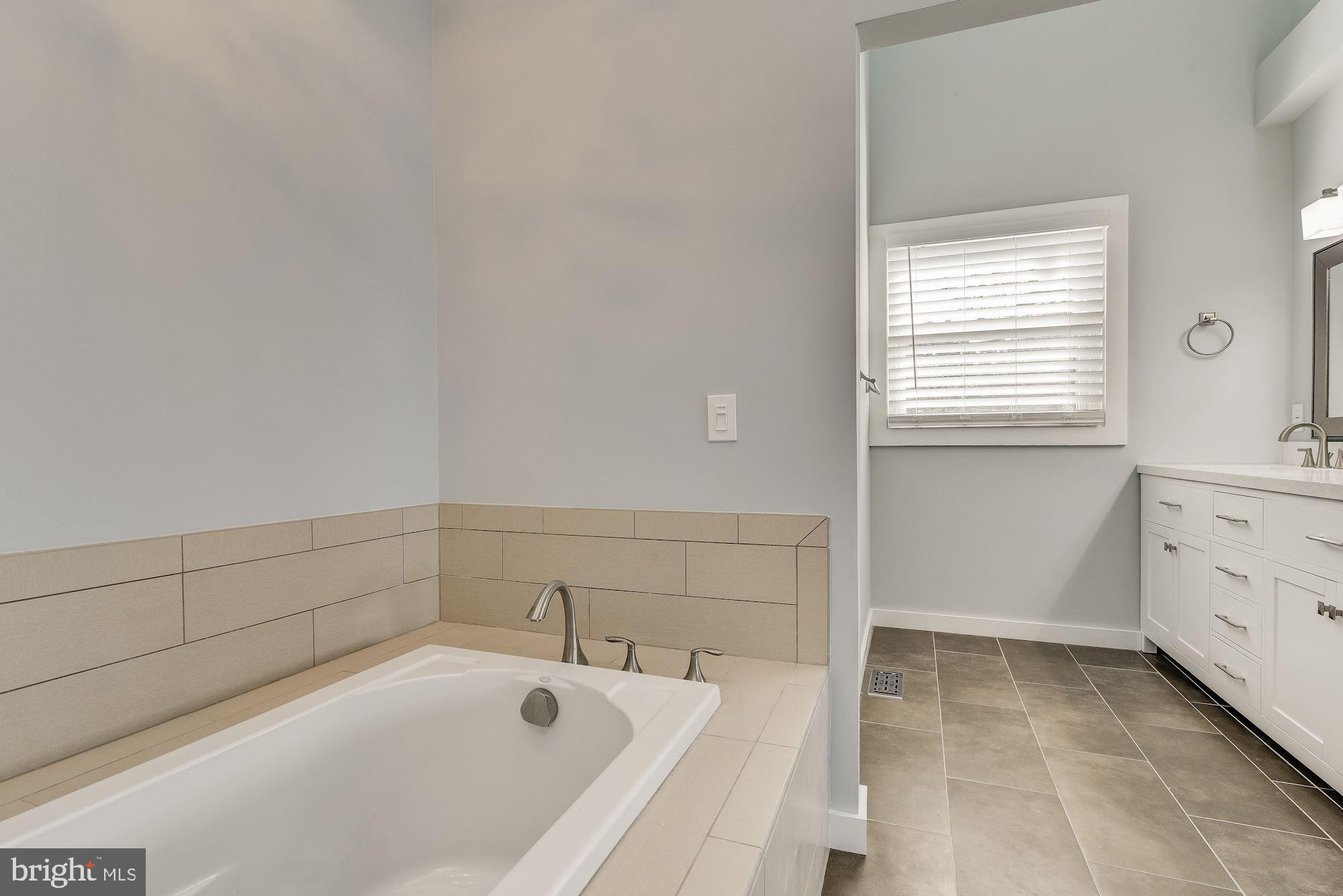 237 Long Point Road Crownsville, MD 21032 - Photo 47 of 77 Soaking Tub & Double Vanity