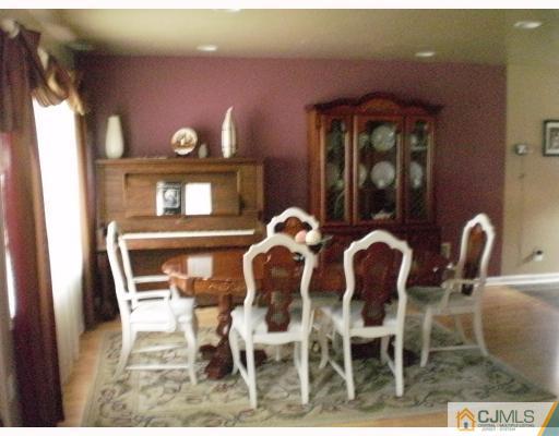 10 Brookville Road Edison, NJ 08817 - Photo 3 of 11 a dining room with furniture and window