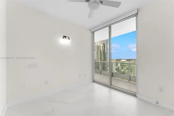 a view of a room with sliding glass door
