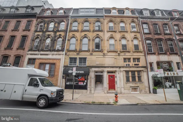 a car parked in front of a building