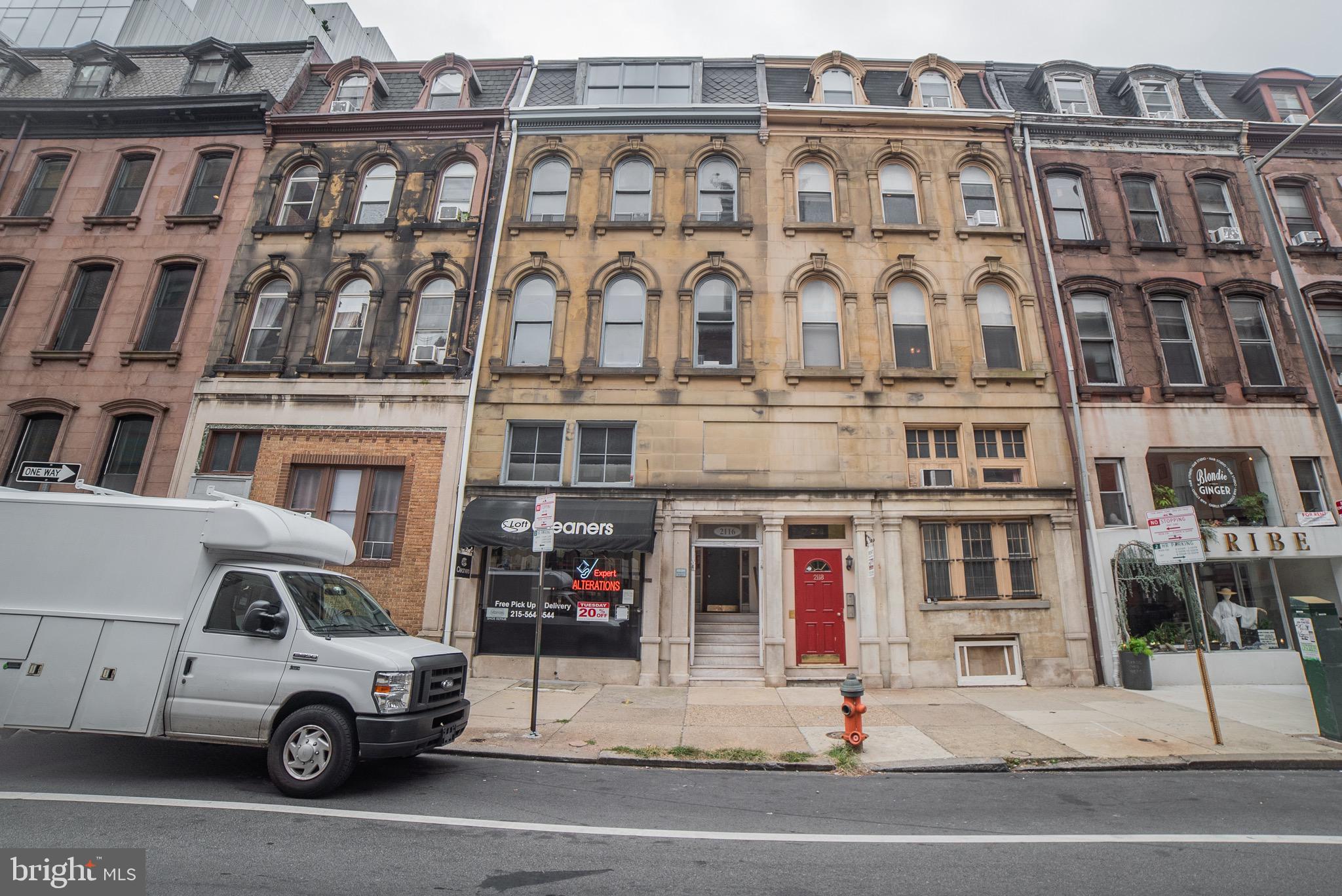 a car parked in front of a building
