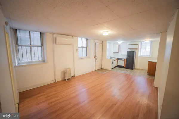 a view of livingroom with furniture and wooden floor
