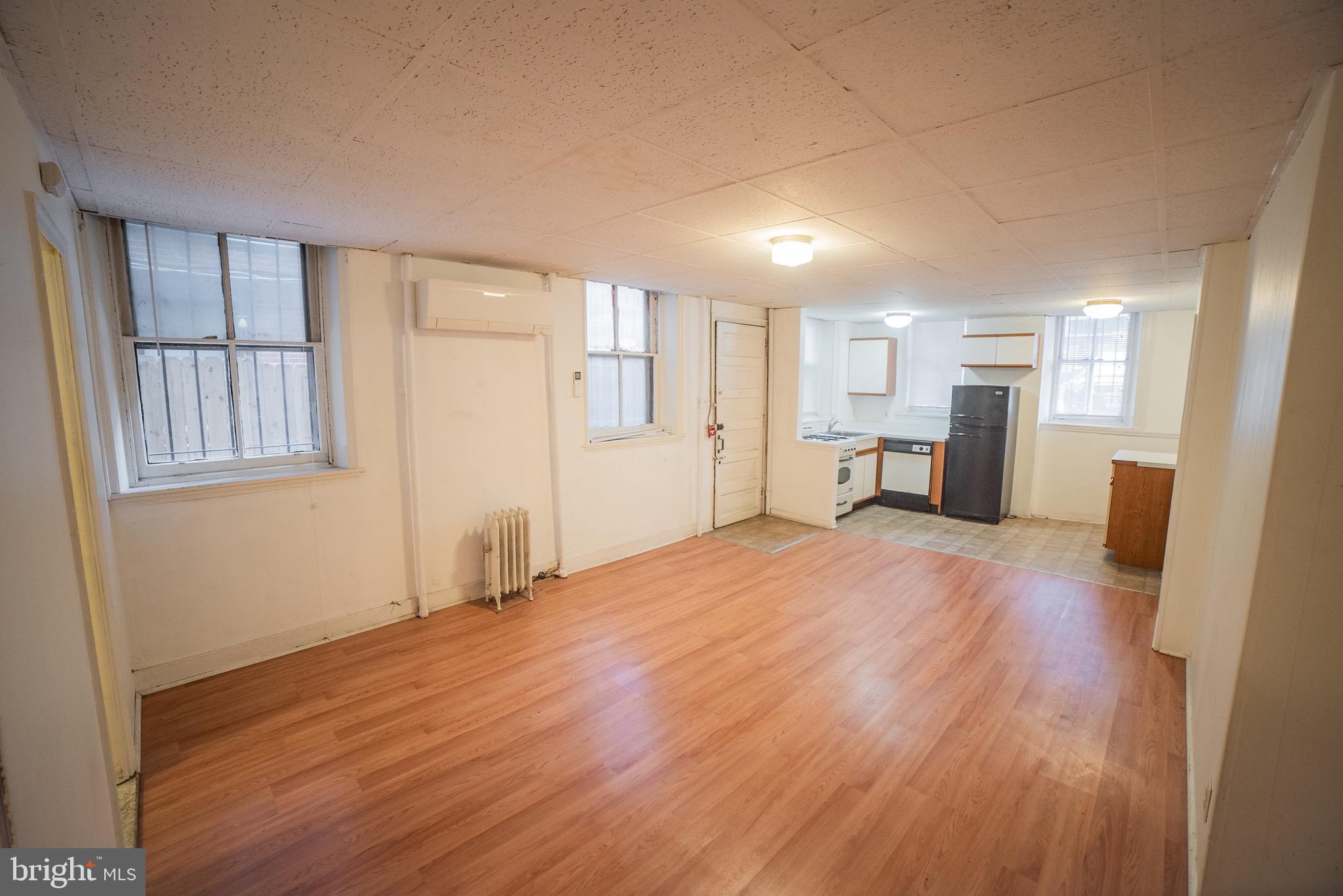 2116 Walnut Street Philadelphia, PA 19103 - Photo 2 of 12 a view of livingroom with furniture and wooden floor
