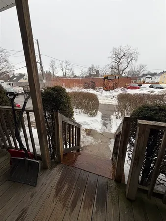 a view of balcony with furniture